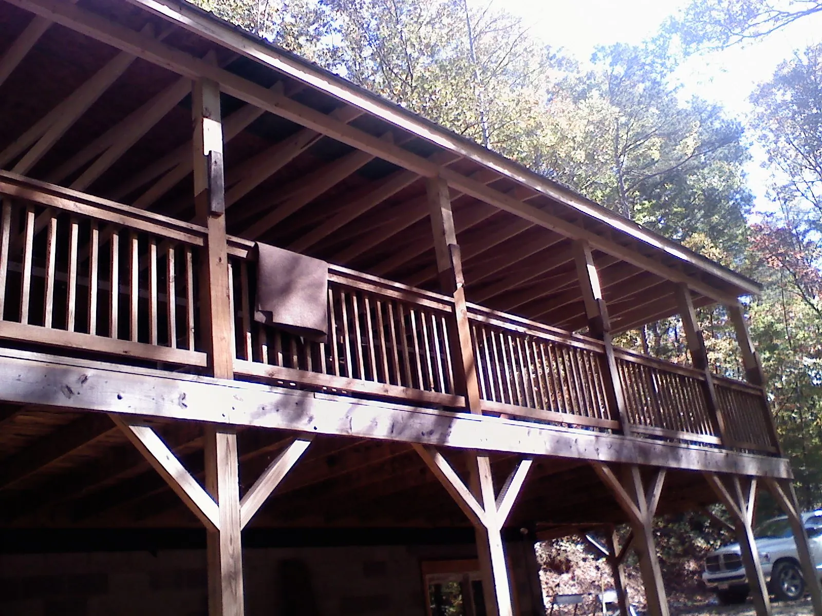 Timber framing under a new elevated porch and deck — Roof Leak Repair in Red Feather Lakes by Roofing Brothers